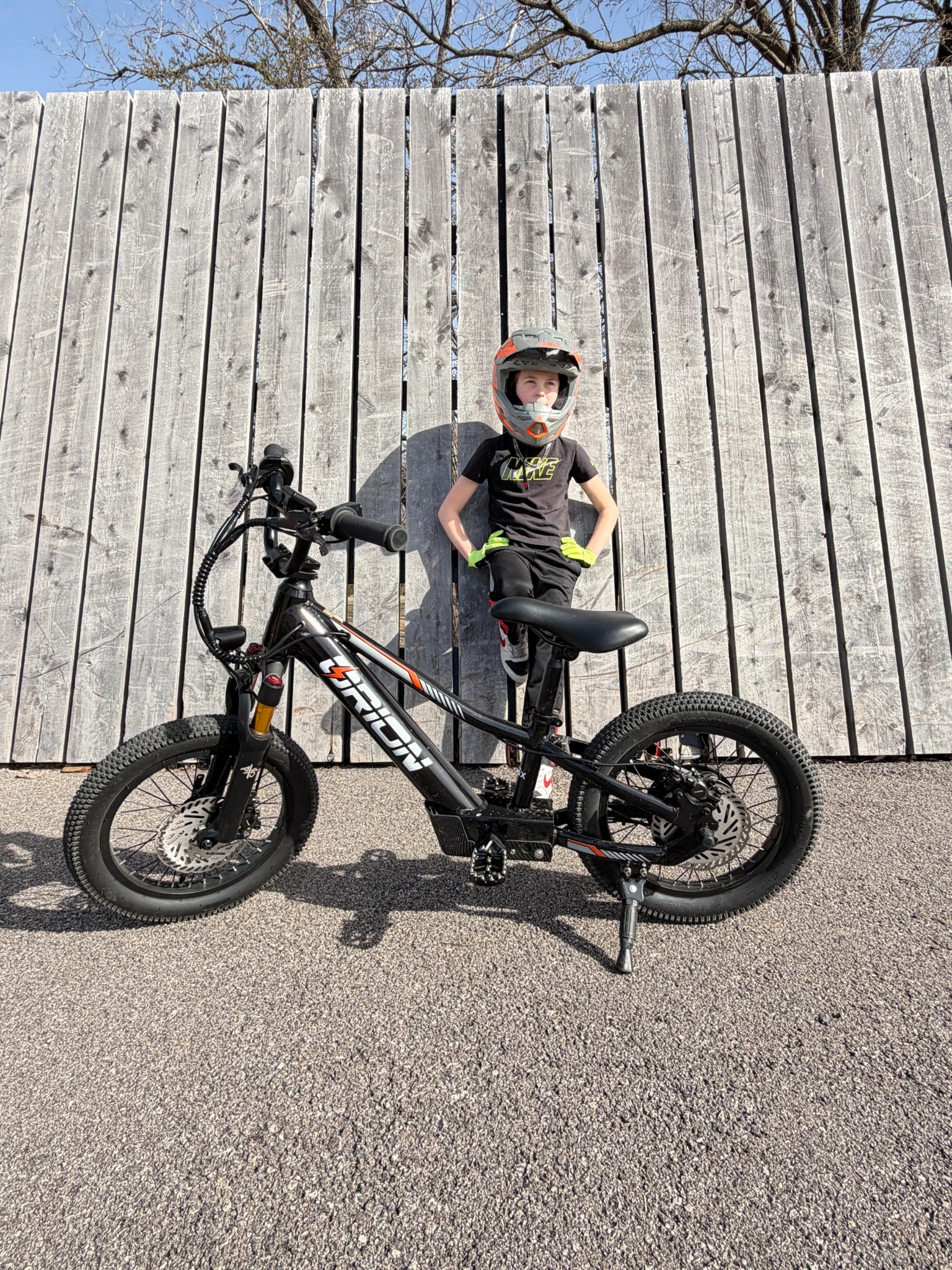 Young rider with an Orion e16X electric balance bike